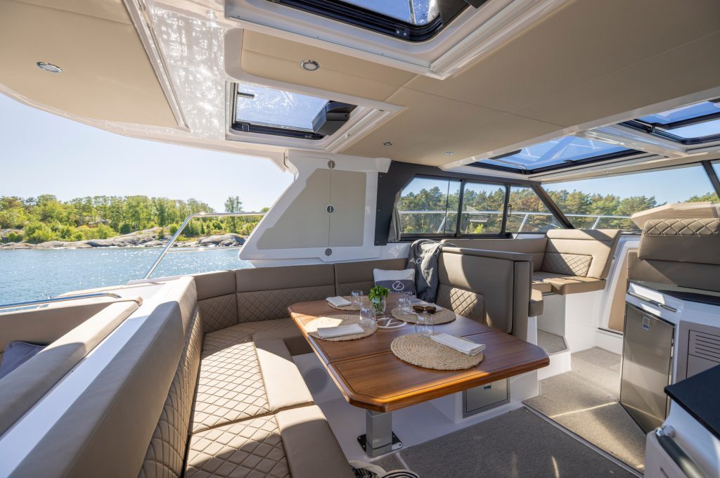 Aquador 400 HT cockpit and deck — representative photo