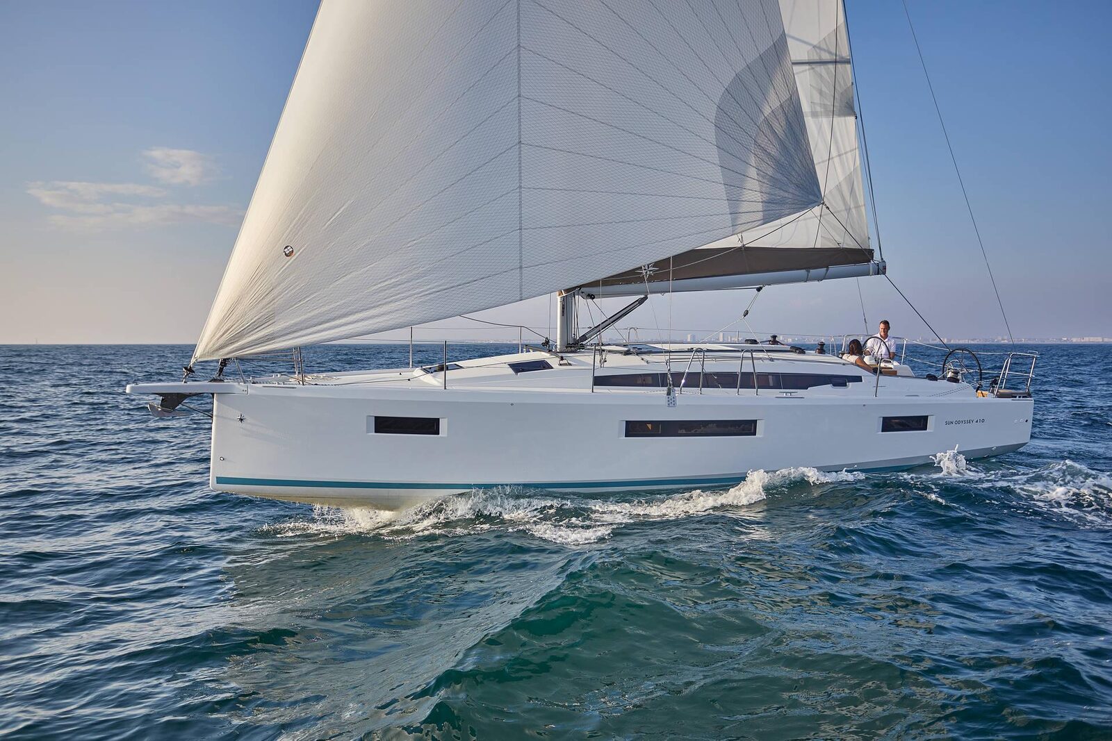Jeanneau Sun Odyssey 410 sailing under full main and genoa
