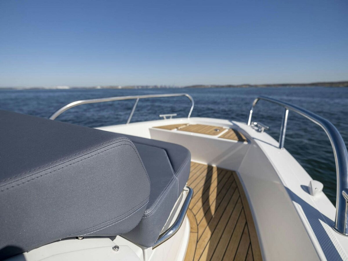 Nimbus T8 bow seating and sun pad over open water