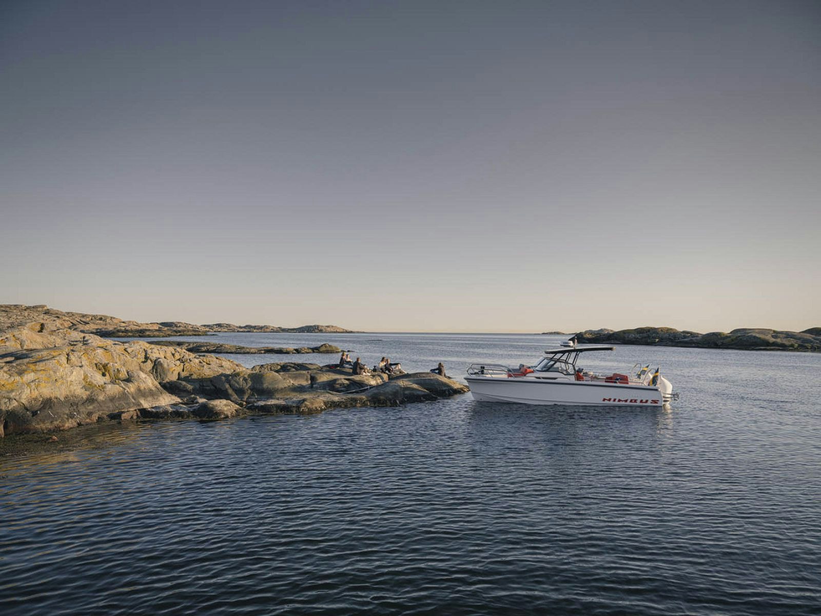 Nimbus T8 cruising past a Boston Harbor lighthouse